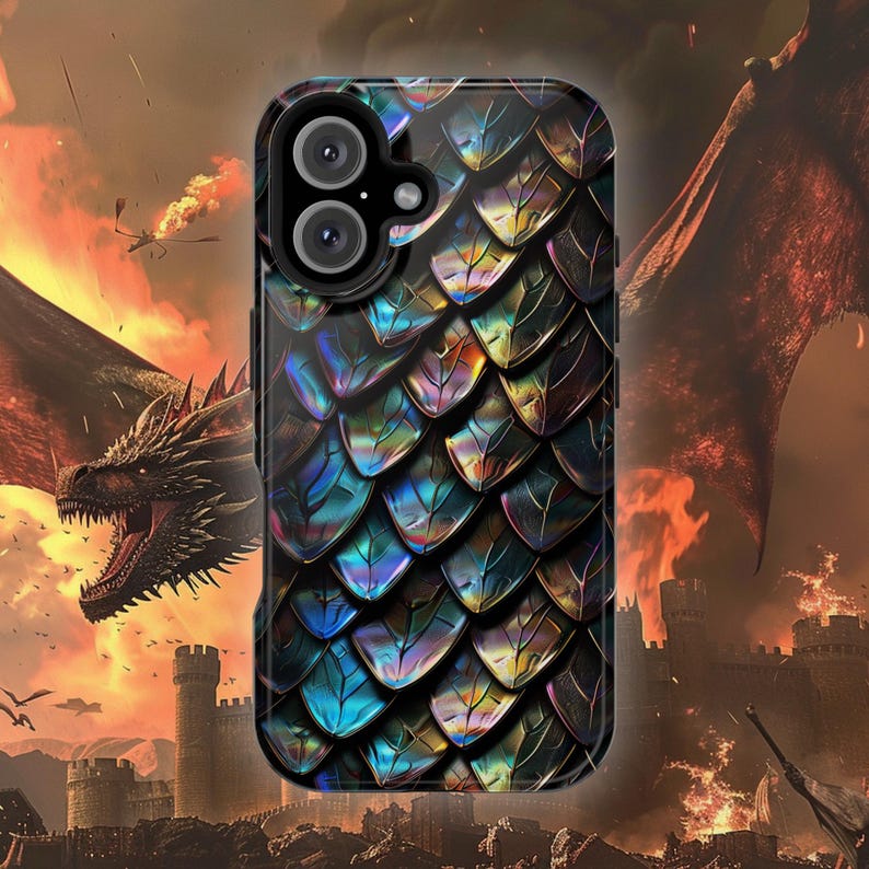 May include: A smartphone case featuring a repeating pattern of iridescent dragon scales in shades of blue, green, and gold. The design includes a cutout for a dual-lens camera system on the upper left side, showcasing a textured, metallic finish.