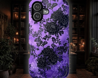 May include: A smartphone case featuring a vibrant purple background with a detailed black floral lace pattern. The design includes multiple rose motifs and intricate vine details, with a dual-camera cutout located in the upper left corner.