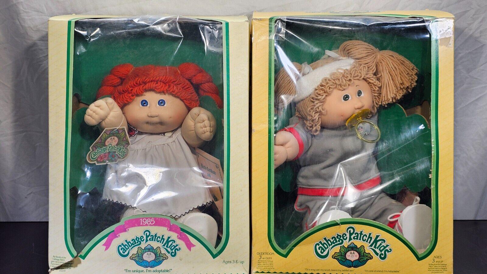 Lot of 2 Open Box Cabbage Patch Kids 1985 N 1983 two dolls with adoption papers