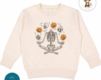 Skeleton Juggling Pumpkins Fall Kids Sweatshirt | Custom Halloween Tshirt | Funny Spooky Kids Halloween Sweatshirt