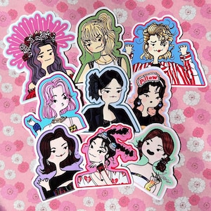 May include: A set of three ceramic mugs with a speckled, matte finish. The mugs are in shades of cream, light brown, and dark brown. Each mug has a simple, minimalist design, perfect for coffee or tea.