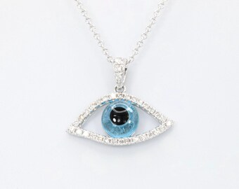 Collier pendentif œil protecteur en or blanc 14 carats et diamants