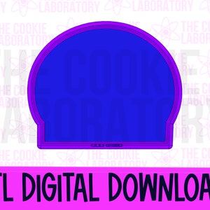 May include: A 3D printable STL file for a cookie cutter shaped like the head of a cartoon character. The cutter is blue with a purple outline and the text "The Cookie Laboratory" is visible on the bottom.