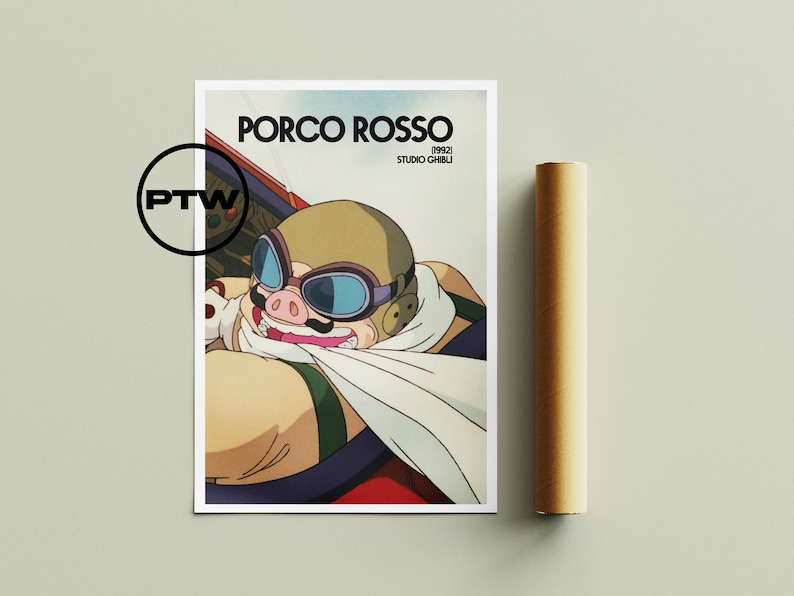 May include: A poster featuring a cartoon pig wearing goggles and a scarf, with the text "PORCO ROSSO 1992 STUDIO GHIBLI" printed below. The poster has a white background and is framed by a white border.