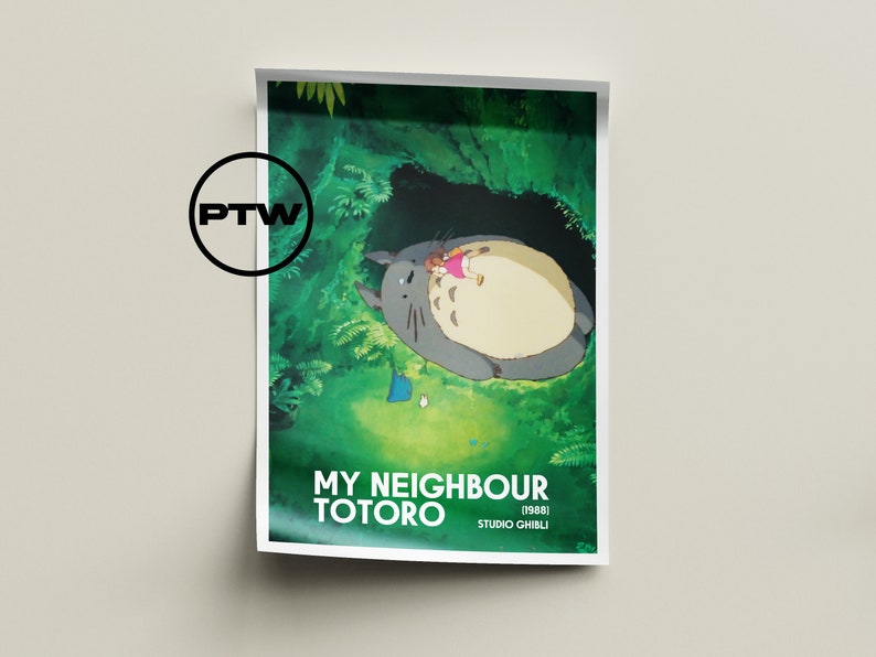 May include: A poster featuring a scene from the animated film "My Neighbor Totoro." The image shows Totoro, a large gray forest spirit, with a girl in a pink dress. The background is lush green foliage. The poster includes the film's title and the Studio Ghibli logo.