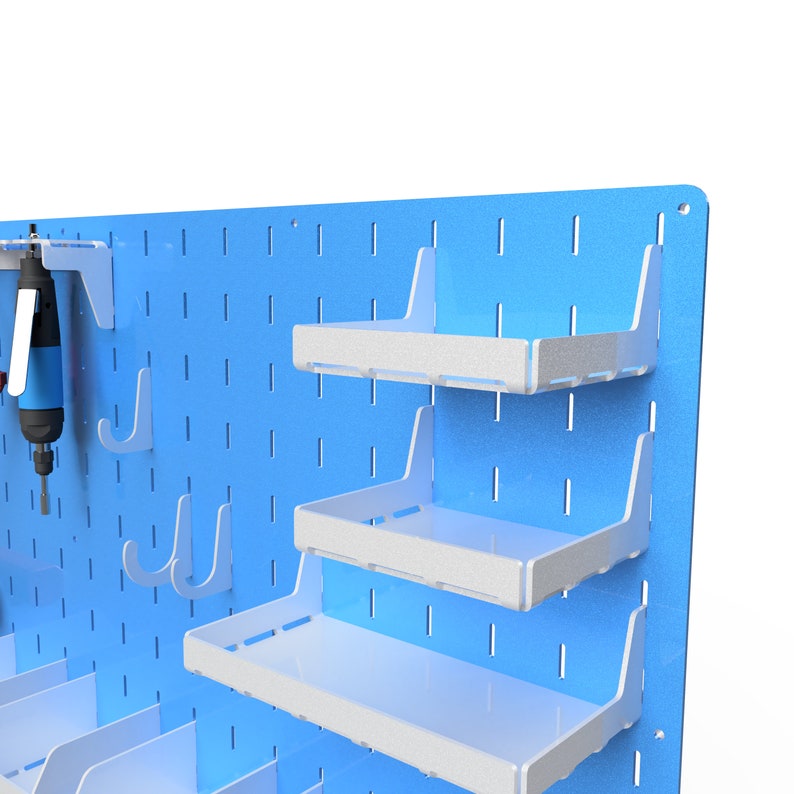 May include: A blue pegboard wall organiser with white shelves and hooks. The shelves are adjustable and can be used to store tools, supplies, or other items. The hooks can be used to hang tools, cords, or other items.