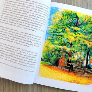 This is a photo of the monograph Cajal's Canopy of trees by renowned artist and Fulbright Scholar Dawn Hunter, opened to a page that features Cajal reading under a tree.