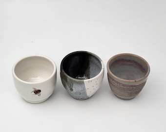 Hand-thrown ceramic honey pots