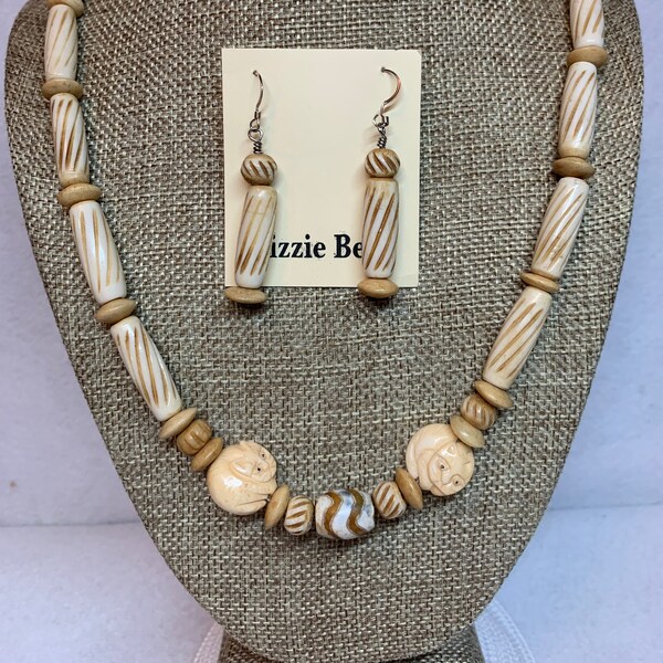 Necklace and earring set, carved bone cats (2) etched agate, bone pipes and spacers, necklace is 22 inches long with silver clasp