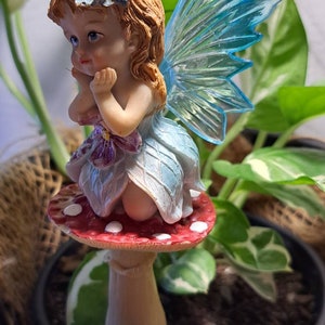 4 Garden fairy stakes ideal for fairy gardens great for imagination and pretend play. Cute kids. Great gifts. Stunning colours.