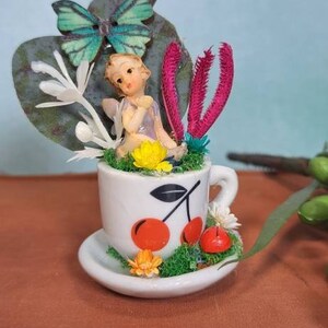 The cutest mini fairy garden in tiny teacup set. Imagination play, creative play for kids. Gift ideas for girls or boys. Mini centrepieces