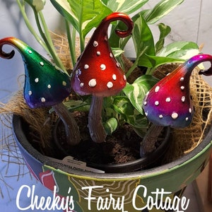 3 pce.Whimsical metallic mushroom garden stake for fairy gardens great for imagination and pretend play. Cute kids. Great gifts. Stunning