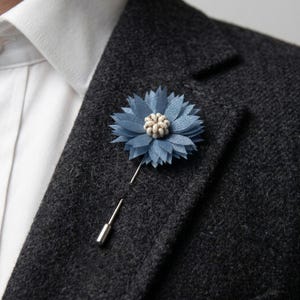 May include: A handmade wooden sign with the text "Welcome to our home" in a handwritten style. The sign is painted white with a distressed finish and a dark brown border. It is designed for indoor or outdoor use.