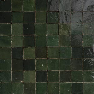 May include: A collection of square tiles in a range of green hues, from dark forest to lighter olive shades. The tiles have a glossy, slightly irregular surface, possibly indicating a handcrafted or vintage style. The layout forms a textured, geometric design.