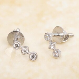 Sterling Silver Dangle Earrings: Cubic Zirconia Three Stone Drop