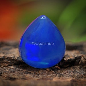 Blue Fire Opal Cabochon: Pear Gemstone, Spiritual Crystal (11x10x4.5 mm)