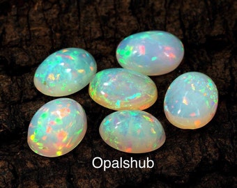 6x8mm Äthiopische Opal Cabochons. 6x8mm Opalcabochons. Feueropal Cabochon oval. Feueropal Cabochons. Loser Opal. Feueropal Edelsteine. Opal Stein