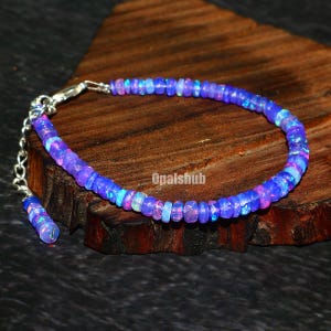 Ethiopian Opal Bracelet: 925 Sterling Silver, Faceted Rondelle Beads