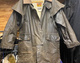 Vintage Kakadu Traders Australia oilskin short duster coat with removable wool fleece lining.