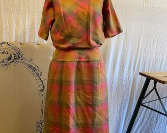 1950’s vintage pink, orange, yellow, and green plaid wool dress by Stacy Ames. Excellent condition.sz.M
