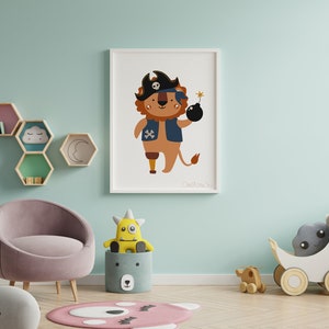 May include: A colourful illustration of a lion wearing a pirate hat and holding a bomb. The lion is brown with a blue waistcoat and a white skull and crossbones on the waistcoat. The lion has a wooden leg. The illustration is on a white background with the text "Owl & Me Studio" at the bottom.