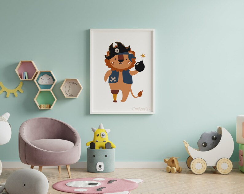 May include: A colourful illustration of a lion wearing a pirate hat and holding a bomb. The lion is brown with a blue waistcoat and a white skull and crossbones on the waistcoat. The lion has a wooden leg. The illustration is on a white background with the text "Owl & Me Studio" at the bottom.