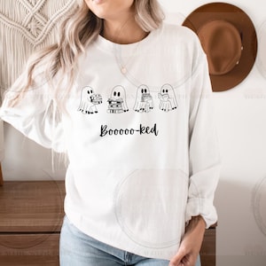 Booooo-ked Sweatshirt | Unisex Heavy Blend™ Crewneck Sweatshirt