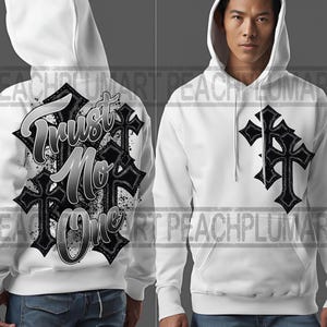May include: White hooded sweatshirt with a black and gray graphic print of crosses and the text "Trust No One".