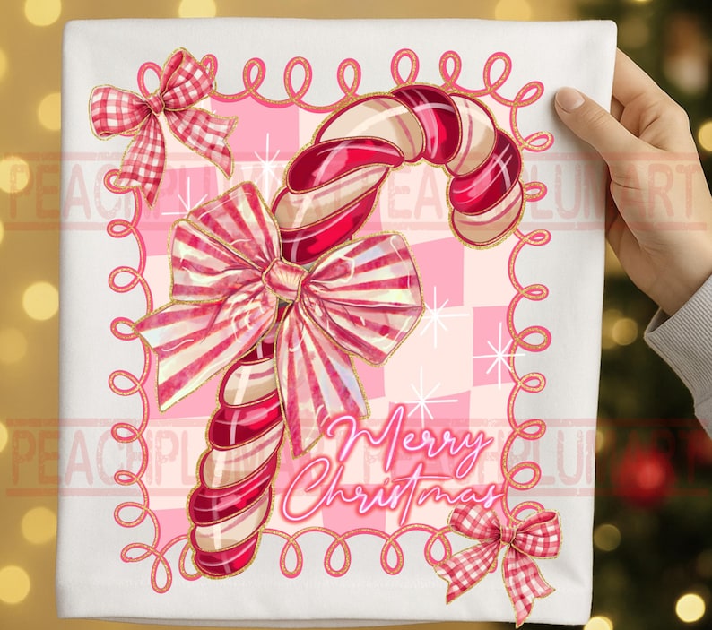 May include: A white square Christmas-themed design featuring a candy cane with red and white stripes, adorned with bows. The words "Merry Christmas" are written in cursive. The background is a pink and white checkered pattern.