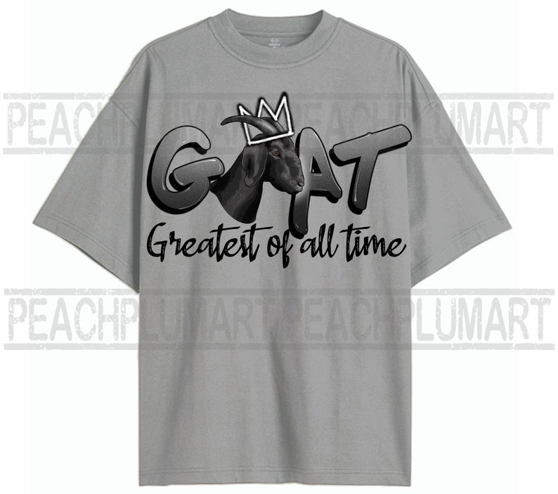 May include: A gray t-shirt with a black and white graphic of a goat wearing a crown. The text "GOAT Greatest of all time" is printed below the goat.