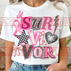 May include: White t-shirt with the word "SURVIVOR" in a collage of pink, gray, and black letters. The design includes a pink ribbon, a butterfly, a star, a bow, a disco ball heart, and a lightning bolt.