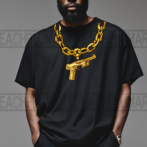 May include: A black t-shirt with a gold chain and a gold gun pendant.
