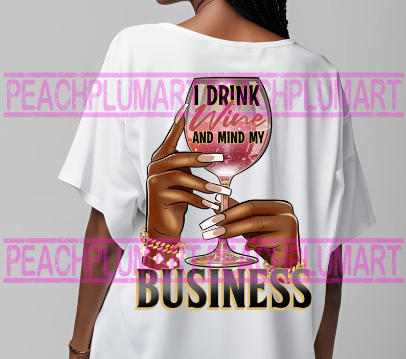May include: White t-shirt with a graphic of a hand holding a glass of red wine. The text "I drink wine and mind my business" is printed on the shirt.