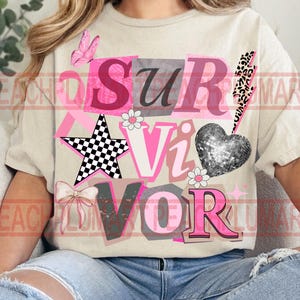 May include: Beige t-shirt with the word "SURVIVOR" in a collage style. The design includes a butterfly, star, heart, and lightning bolt, all in pink, black, and white. The shirt is made of a soft material.