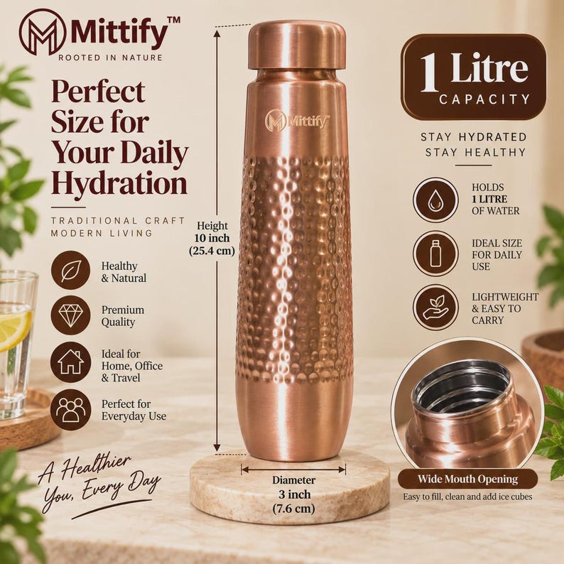 May include: A copper water bottle with a hammered texture, featuring a cylindrical body and a matching cap. The bottle has a 1 liter capacity, a height of 10 inches, and a diameter of 3 inches. The Mittify logo is printed on the front surface.