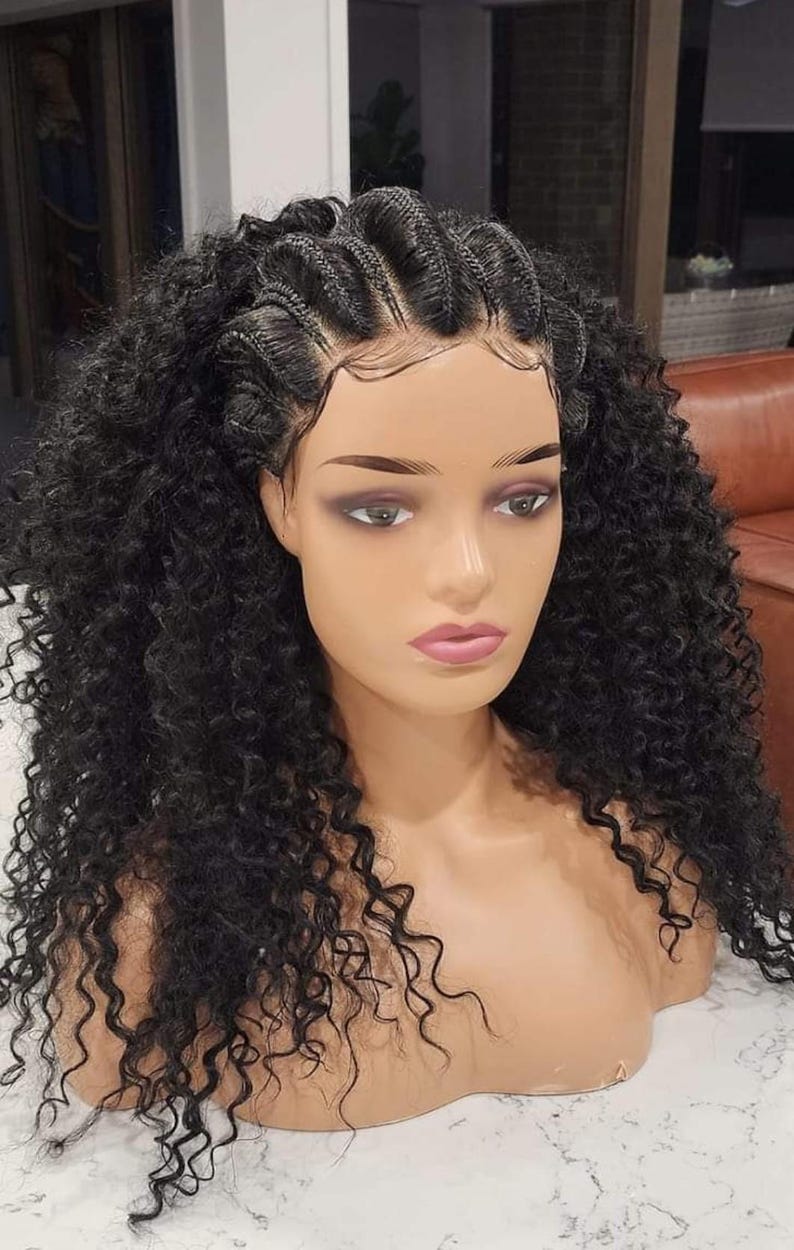 May include: A black curly human hair wig with a lace front and a braided closure. The wig is styled in loose curls and is worn on a mannequin head.
