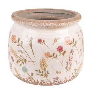 Peut inclure: Un pot de fleurs rond en céramique avec une finition émaillée craquelée de couleur crème. L'extérieur présente un motif délicat de petites fleurs sauvages et d'épis de blé colorés dans des tons de rose, orange, jaune et bleu. Le bord et la base sont bruns.