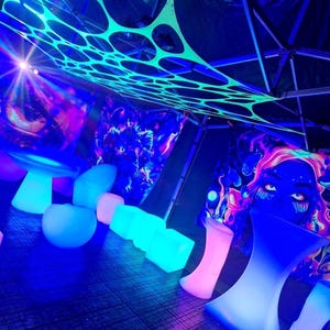 x1 stretchy glow neon webbing event decor, psytrance, festivals, rave, party sensory room, stretch & glow wall hanging and ceiling decor