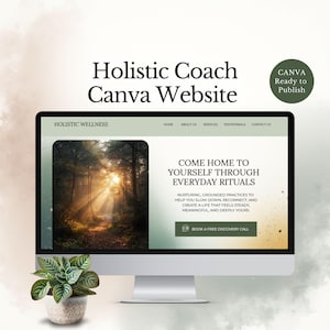 May include: A computer monitor displays a website design for a holistic coach. The website features a forest image and text that reads "Come Home to Yourself Through Everyday Rituals." A small potted plant sits in front of the monitor.