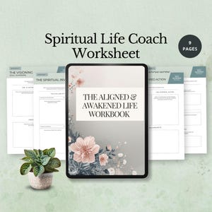 May include: A digital workbook titled "The Aligned & Awakened Life Workbook" on a tablet, with floral accents. The image includes worksheets and the text "Spiritual Life Coach Worksheet" and "9 Pages". A small potted plant is in the foreground.