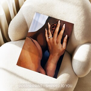 May include: A poster print featuring an artistic illustration of a couple embracing. The artwork depicts a hand with a ring gently touching an ear. The skin tones are warm, and the overall aesthetic is intimate.