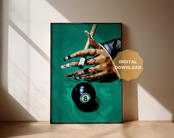 May include: A close-up of a hand with colorful nail polish holding a pool cue over a green felt pool table. A black eight ball is in the foreground.
