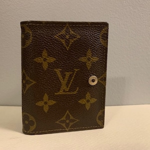 Cartera plegable con monograma de Louis Vuitton