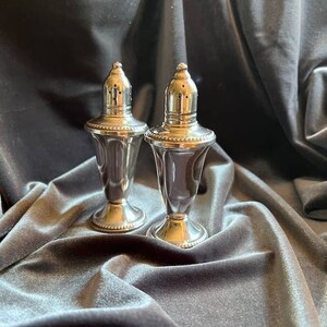 Creazione duchin sale/pepe in argento sterling