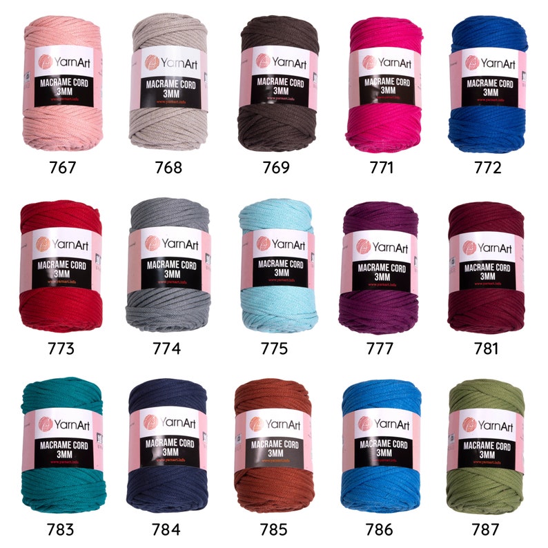 May include: A collection of 15 spools of macrame cord in various colors. Each spool is labeled 'YarnArt Macrame Cord 3MM' and has a corresponding number from 767 to 787.