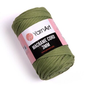 May include: A roll of green macrame cord, 3mm thick, with a label that reads 'YarnArt Macrame Cord 3MM www.yarnart.info'