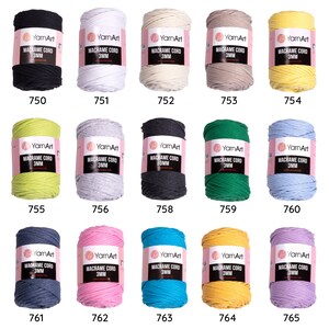 May include: Assortment of 15 spools of 3mm macrame cord in various colors including black, white, beige, yellow, green, gray, blue, pink, turquoise, and purple. Each spool has a label that reads 'YarnArt' and 'Macrame Cord 3MM'.