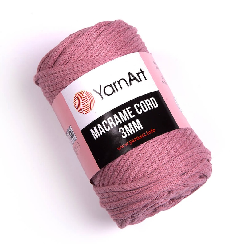 May include: A pink ball of yarn art macrame cord, 3mm thick. The label reads 'YarnArt Macrame Cord 3MM' and 'www.yarnart.info'.