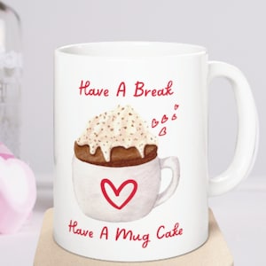 Have a break have a mug cake mug for keto desserts that can be made in the microwave on a white background.