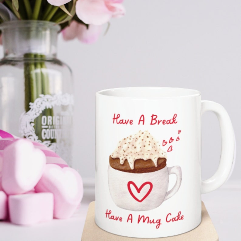 Have a break have a mug cake mug for keto desserts that can be made in the microwave on a white background.